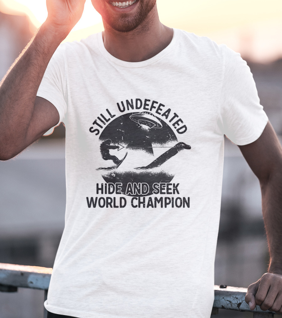 Still Undefeated Hide And Seek World Champion Bigfoot Riding Loch Ness Monster T-Shirt