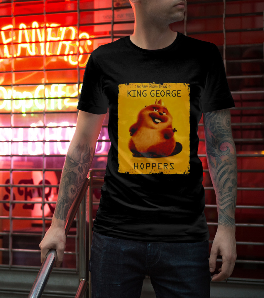 Bobby Moynihan Is King George Hoppers Smiling Cartoon Character With Crown On Orange T-Shirt