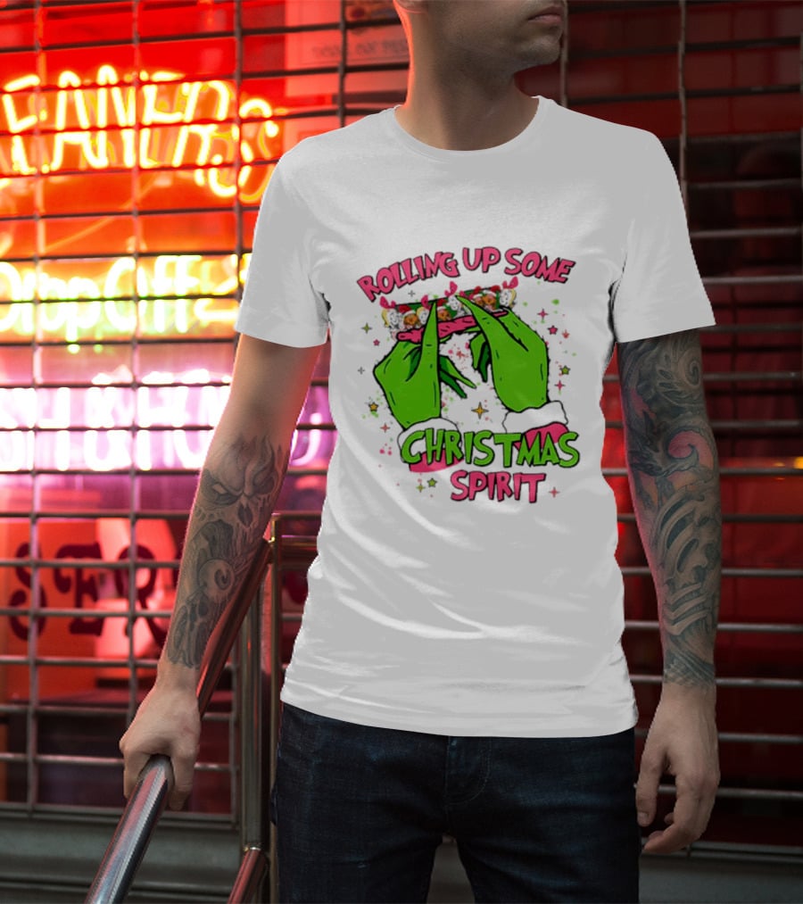 Grinch Rolling Up Some Christmas Spirit With Green Hands And Glitter Stars T-Shirt