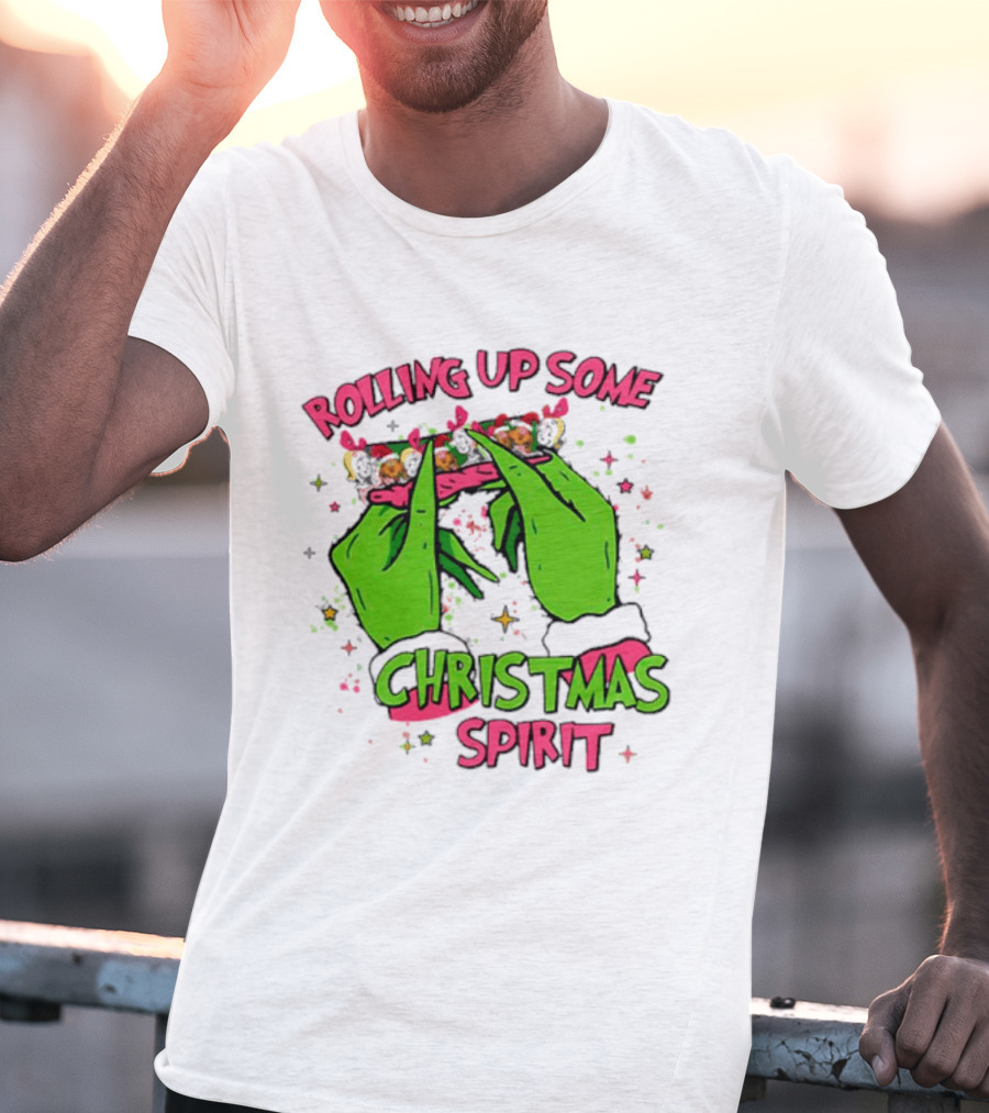 Grinch Rolling Up Some Christmas Spirit With Green Hands And Glitter Stars T-Shirt