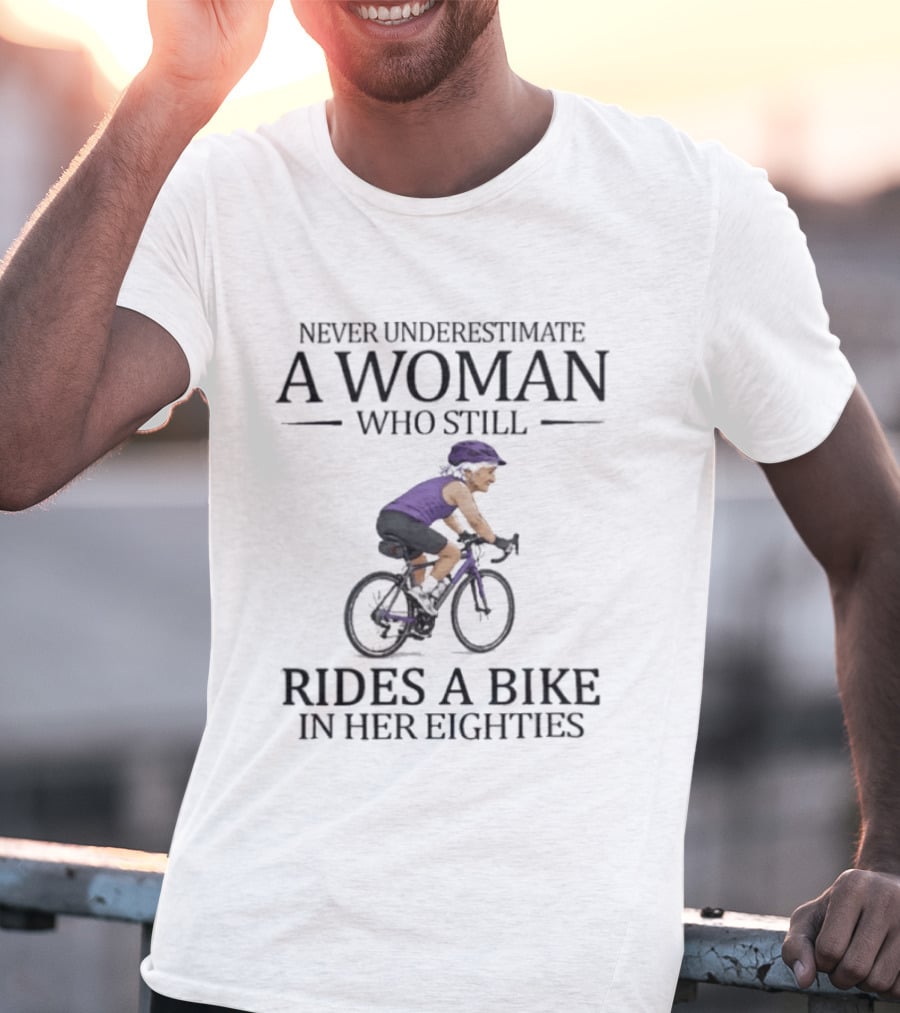 Never Underestimate A Woman Who Still Rides A Bike In Her Eighties Biking Enthusiast In Purple Gear T-Shirt