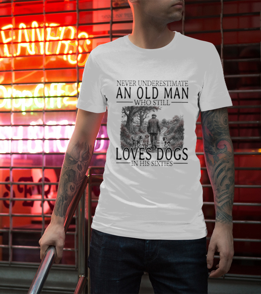 Never Underestimate An Old Man Who Still Loves Dogs In His Sixties 2026 T-Shirt