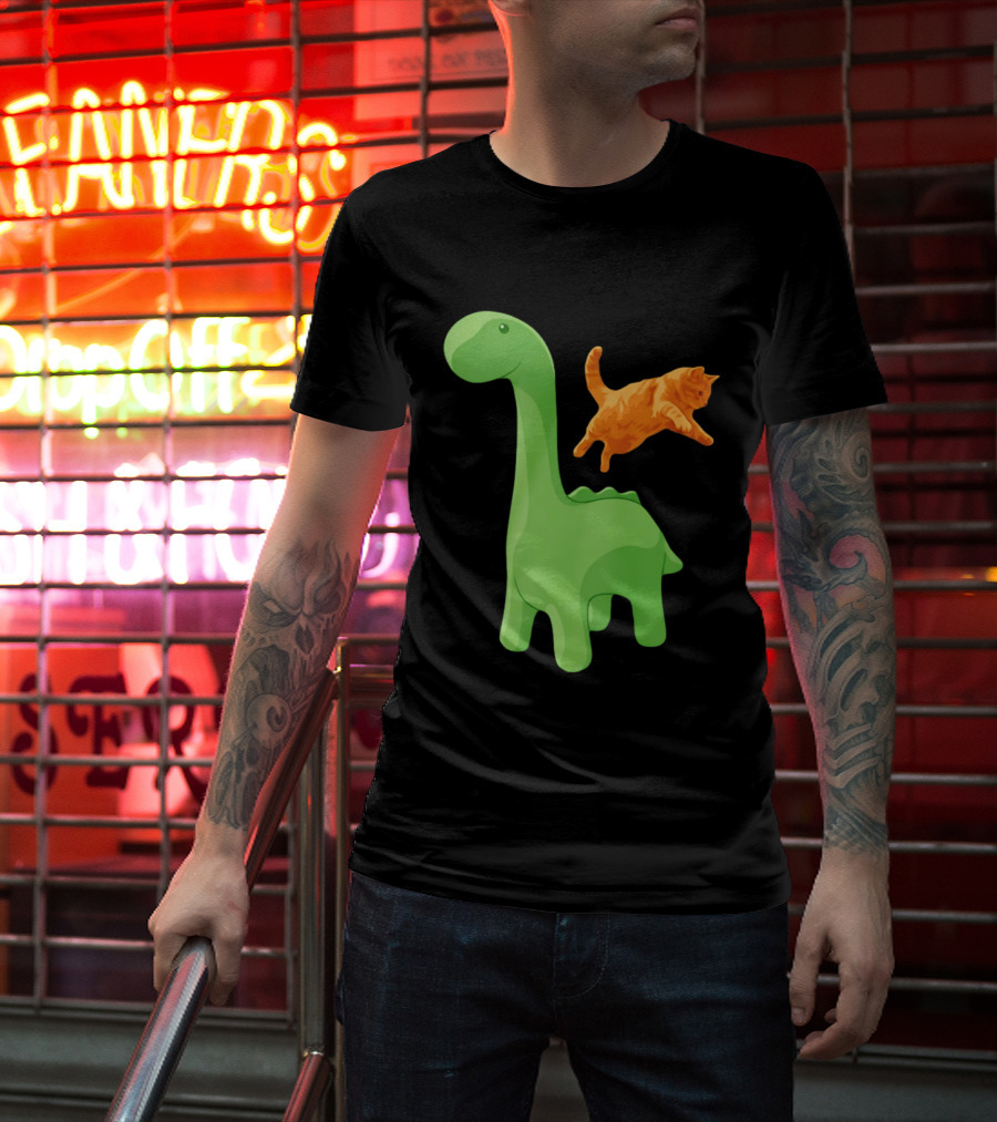 Cat Jumping Over Green Dinosaur Cartoon Image T-Shirt