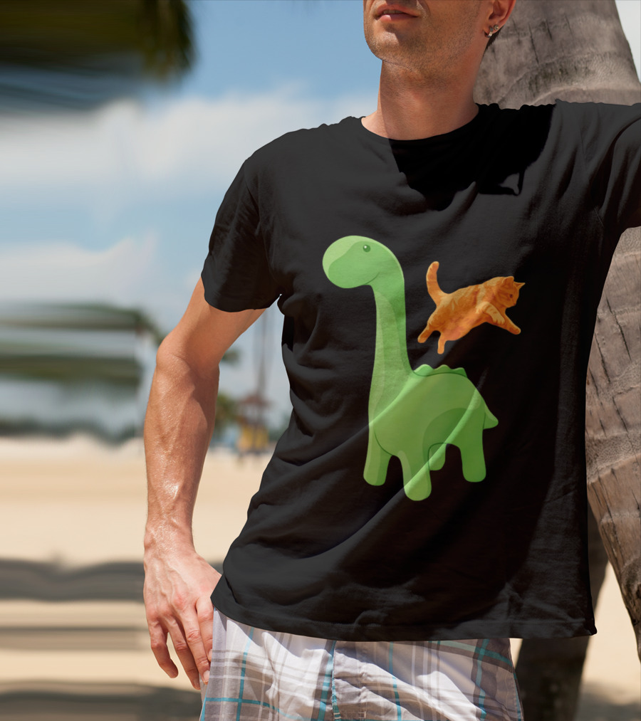 Cat Jumping Over Green Dinosaur Cartoon Image T-Shirt
