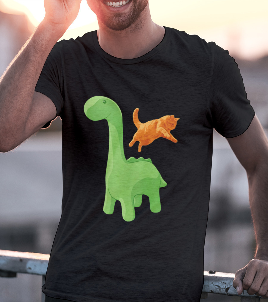 Cat Jumping Over Green Dinosaur Cartoon Image T-Shirt