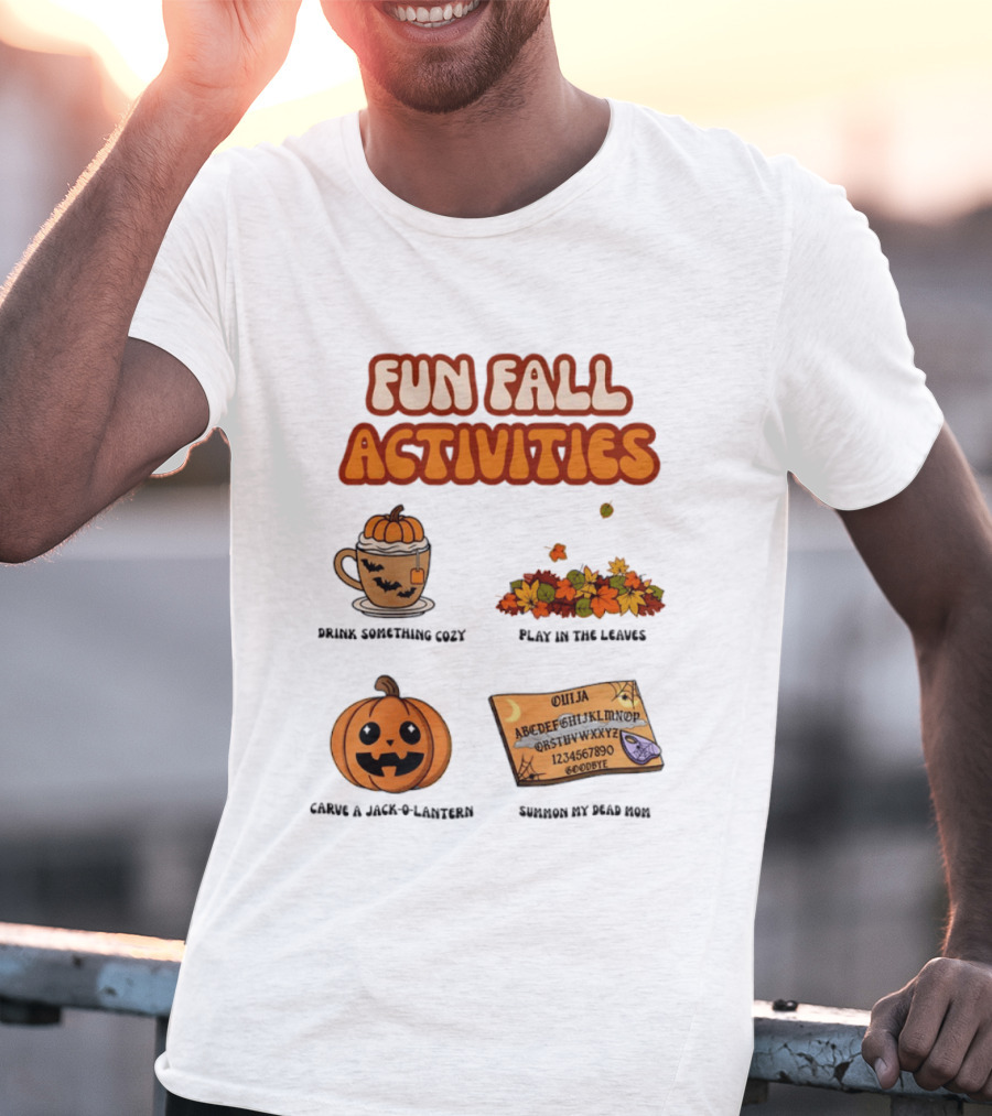 Fun Fall Activities Halloween Drink Something Cozy Ouija Board Carve A Jack O Lantern Play In The Leaves T-Shirt