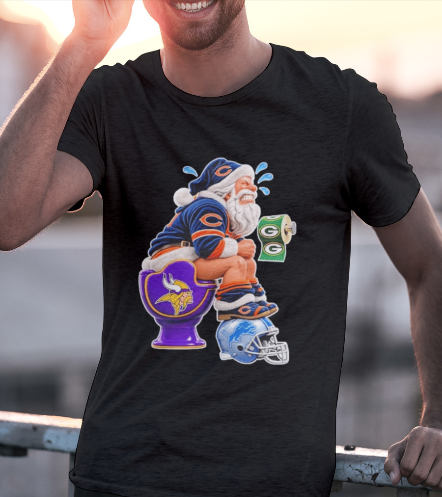 Santa Claus On Toilet Minnesota Vikings Detroit Lions Green Bay Packers Chicago Bears Funny Christmas 2026 Football T-Shirt