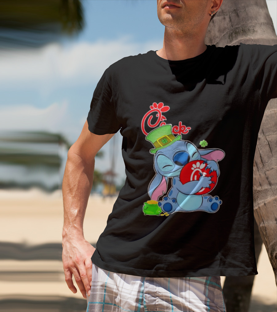 Stitch Holding Chick Fil A Logo With St. Patrick's Day Hat And Clover T-Shirt