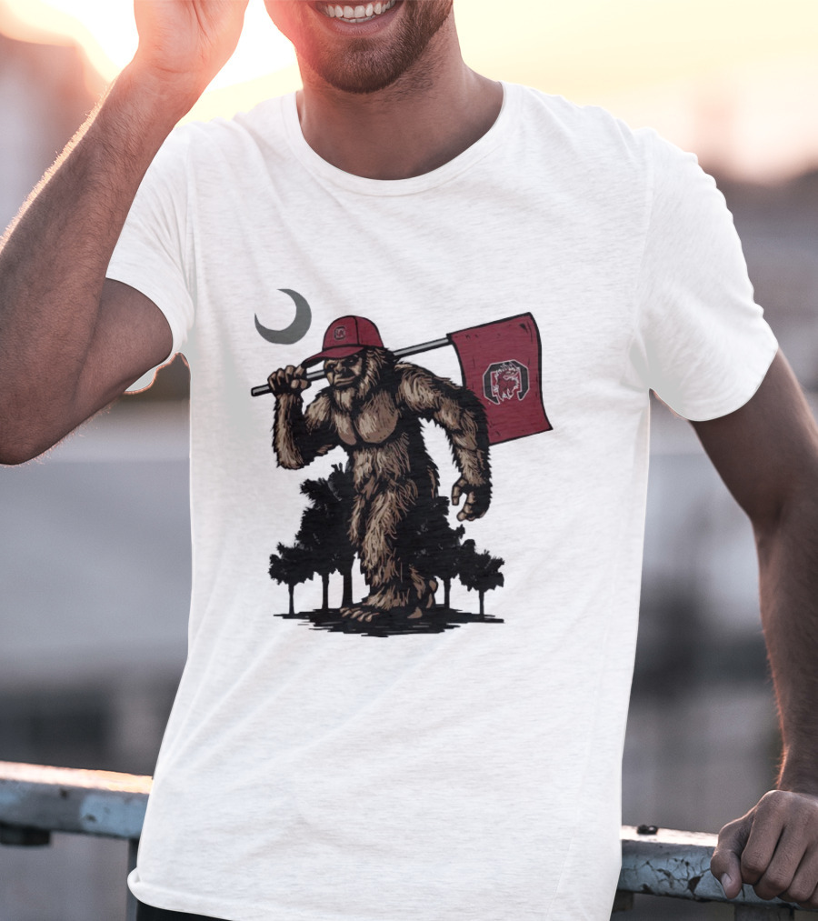 Bigfoot Carrying South Carolina Gamecocks Flag Under Moonlight T-Shirt