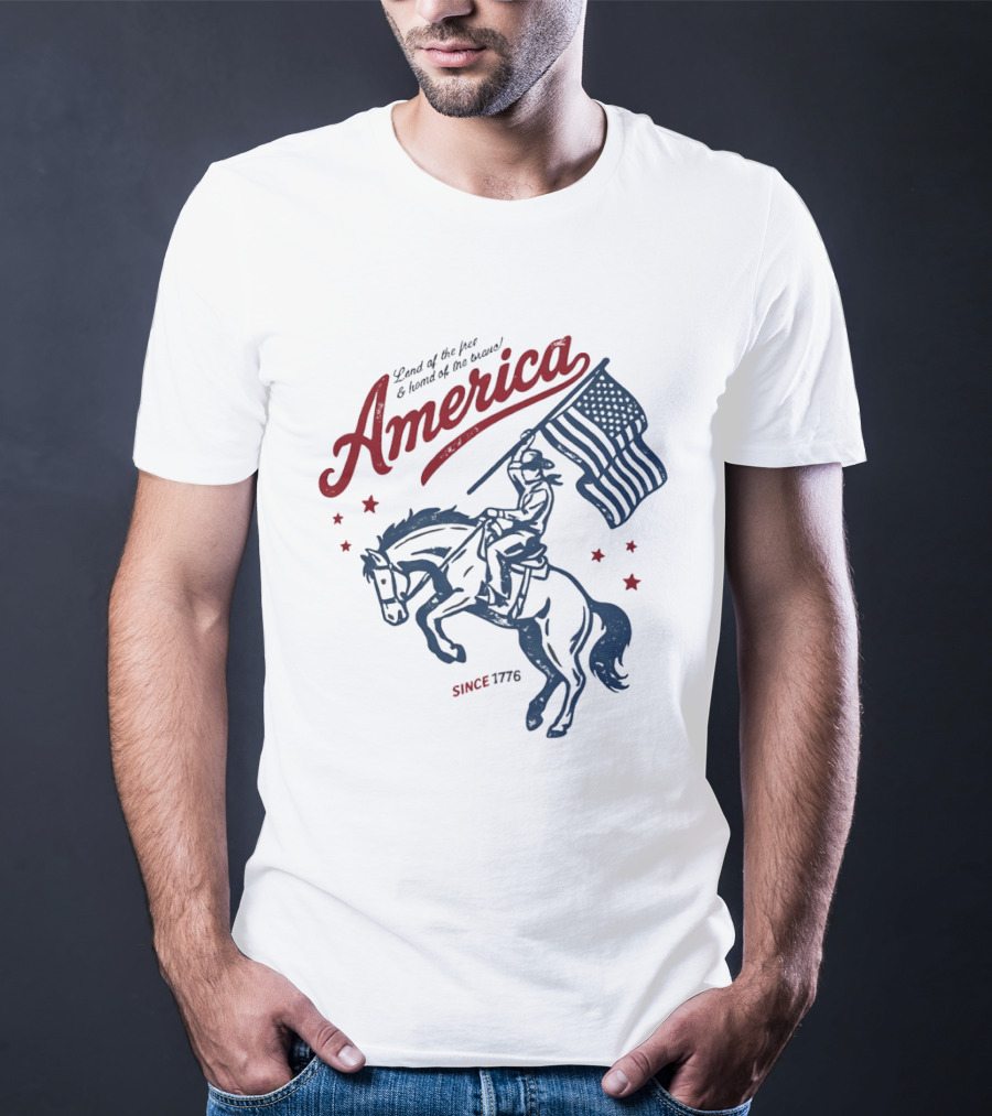 America Land Of The Free Home Of The Brave Since 1776 Cowboy Holding Flag Patriotic T-Shirt