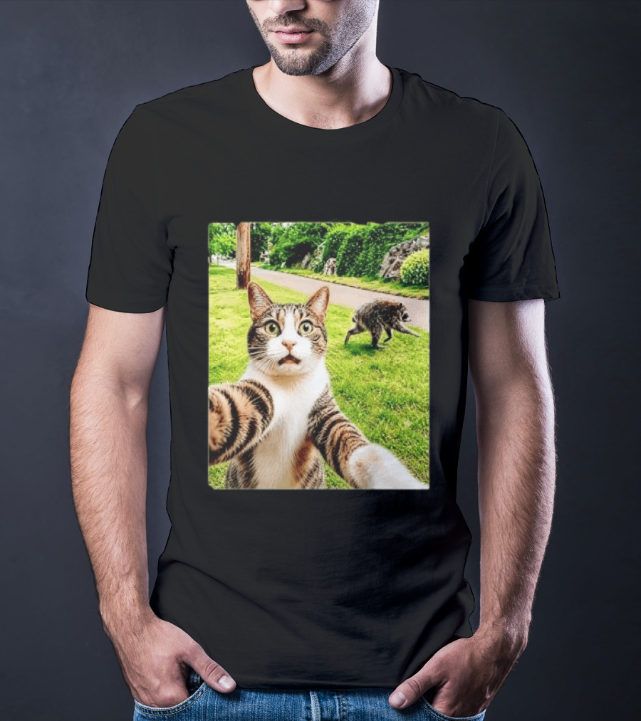 Shocked Face Tabby Cat Taking Selfie With Running Raccoon On Lawn Road T-Shirt