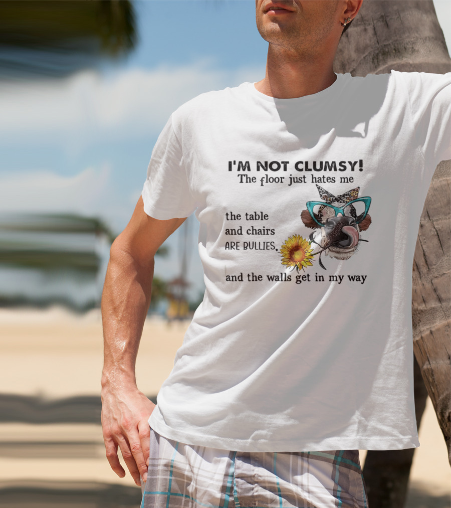 I'm Not Clumsy The Floor Hates Me The Table Chairs Bullies Walls Get In My Way Cow Sunflower Butterfly Glasses Tongue Out T-Shirt
