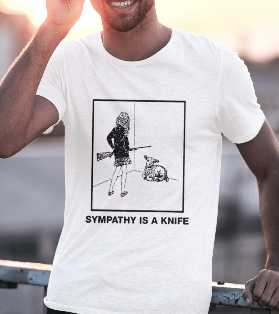 Sympathy Is A Knife Dark Silhouette Holding Object Next To Seated Figure T-Shirt