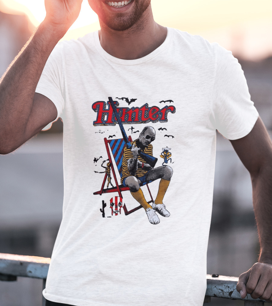 Hunter July 18 1937 February 20 2005 Man Holding Rifle Striped Chair Yellow Socks T-Shirt