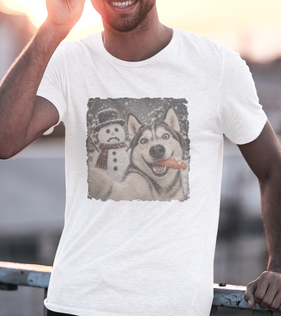 A Sled Dog With A Carrot And A Sad Snowman In A Snowy Winter Scene T-Shirt