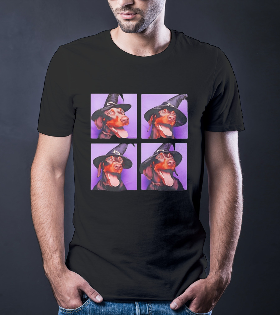 Doberman Pinscher In Witch Hat For Halloween With Purple T-Shirt