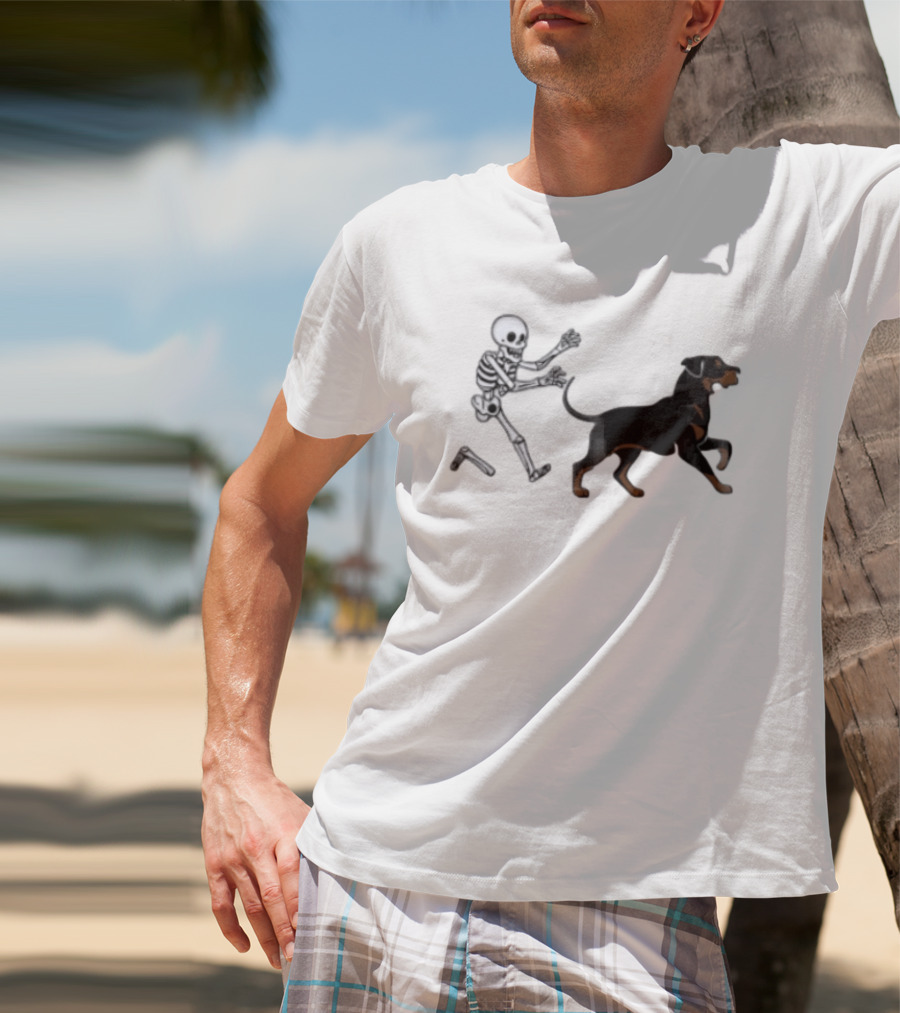 Skeleton Chasing Rottweiler With Bone In Halloween Humor Scene T-Shirt