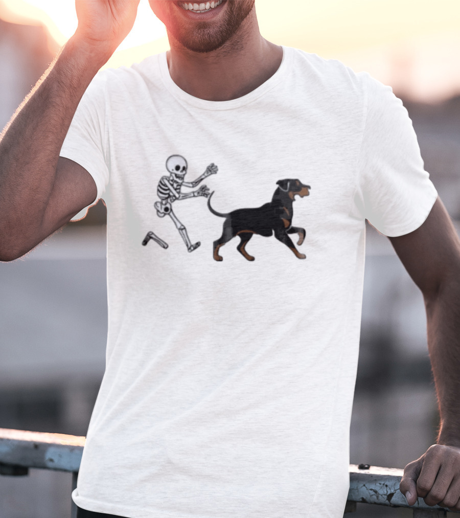 Skeleton Chasing Rottweiler With Bone In Halloween Humor Scene T-Shirt