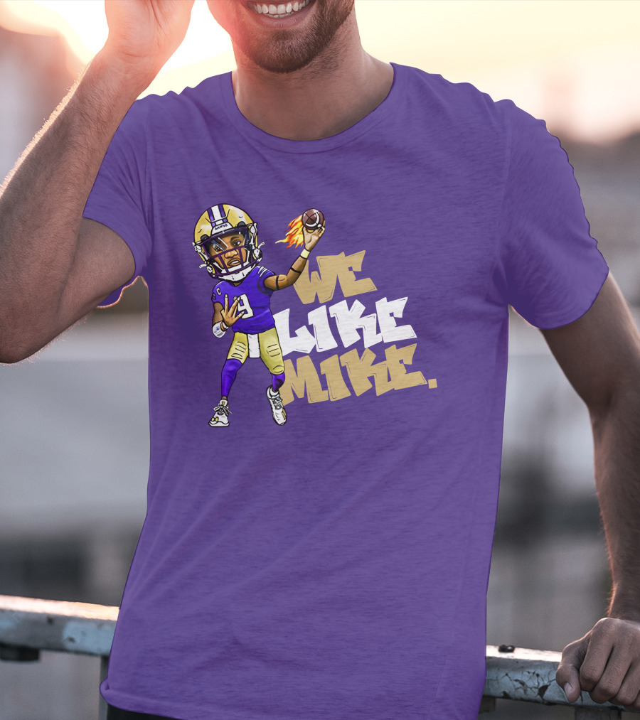 We Like Mike Football Character In Purple And Gold Gear Holding Flaming Ball T-Shirt