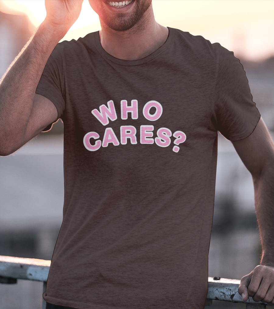 WHO CARES? Pink And White Lettering On Brown Background T-Shirt