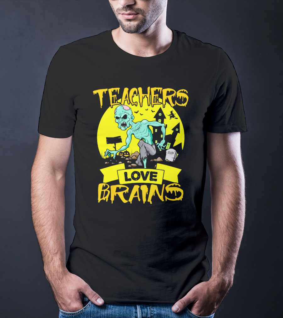 Teachers Love Brains Zombie Halloween Theme With Haunted Houses And Graveyard Background T-Shirt