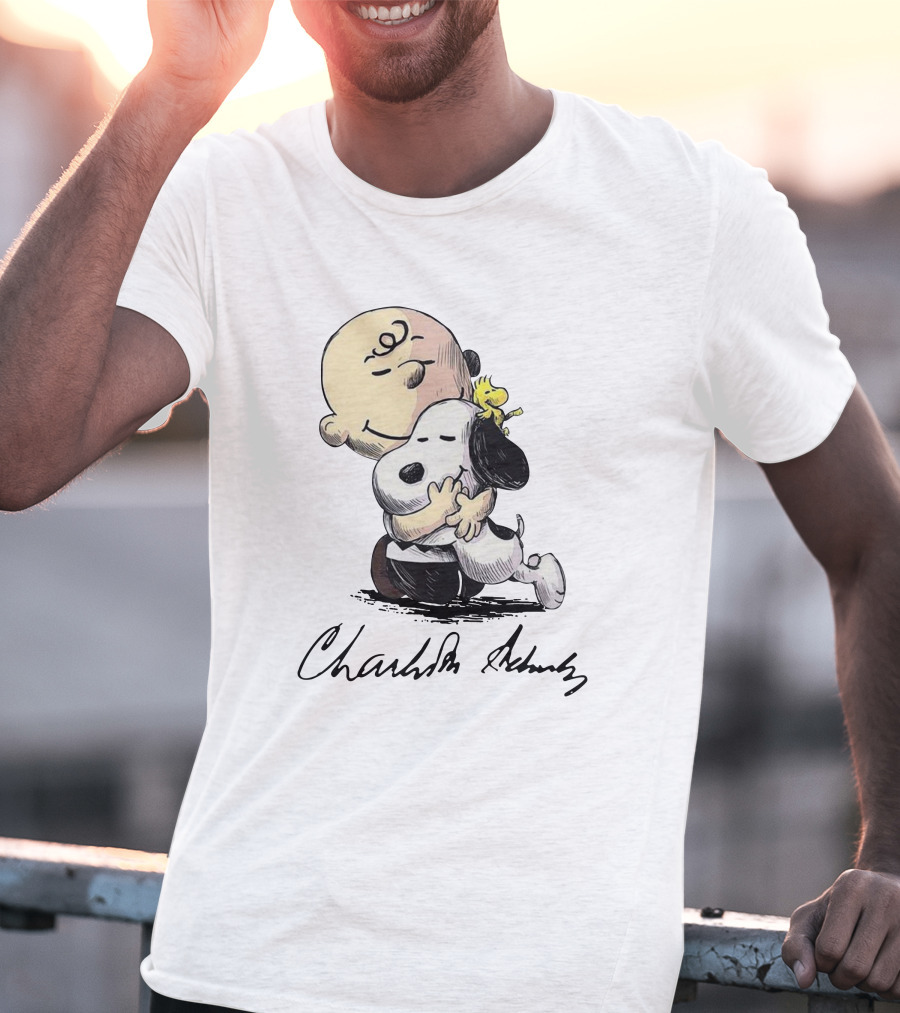 Peanuts Charlie Brown Snoopy Woodstock Hug By Charles Schulz T-Shirt