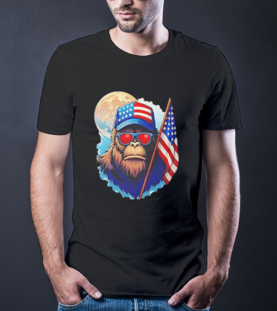 Bigfoot USA Flag Hat Sunglasses Patriotic Moon Background T-Shirt
