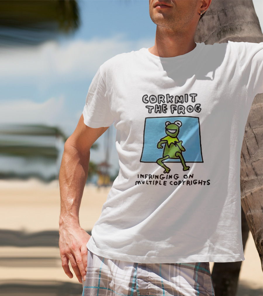 Corkmit The Frog Infringing On Multiple Copyrights Green Frog Cartoon With Blue Background T-Shirt