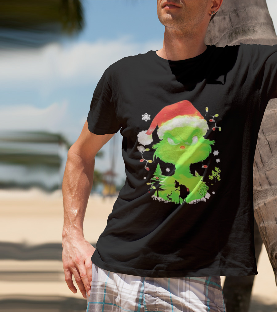 Grinch In Santa Hat Surrounded By Snowflakes And Christmas Lights T-Shirt
