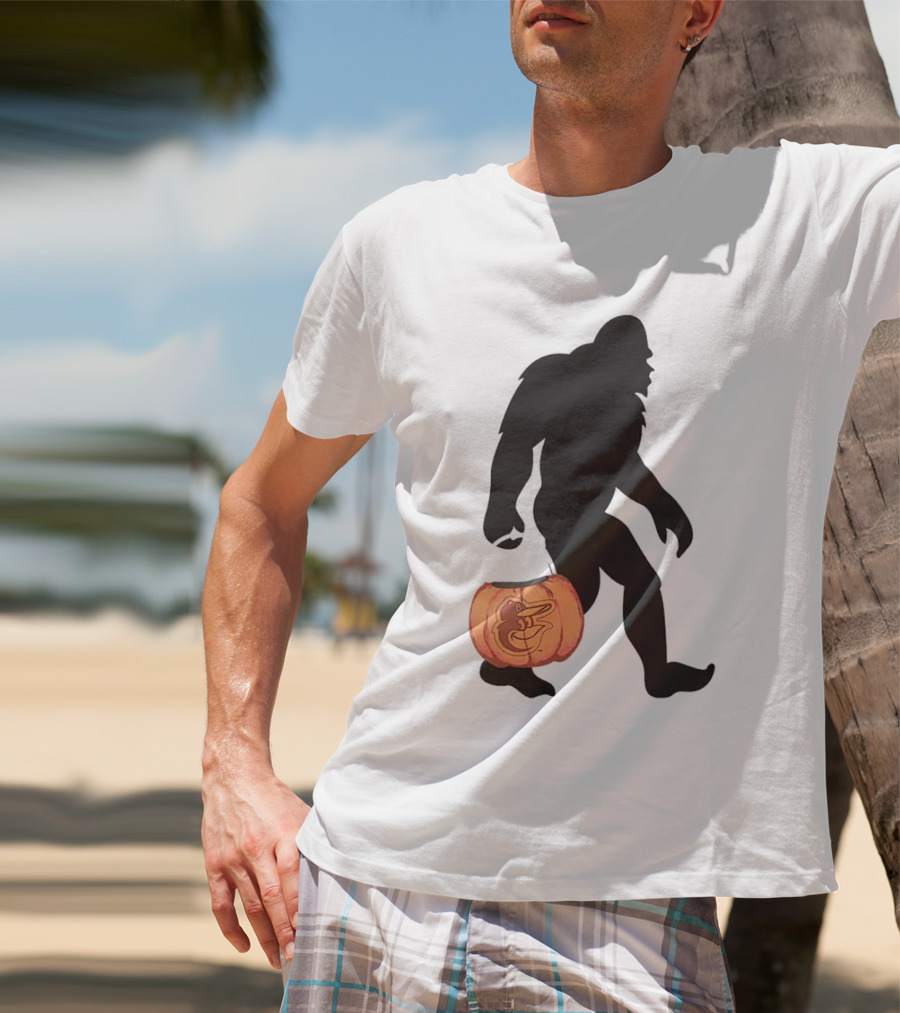Baltimore Orioles Bigfoot Carrying Pumpkin Halloween T-Shirt