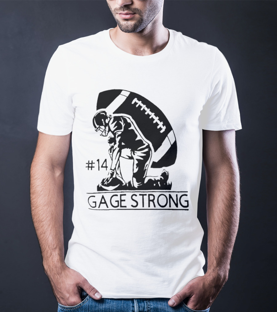 Gage Strong #14 Football Player Kneeling In Front Of Large Football T-Shirt