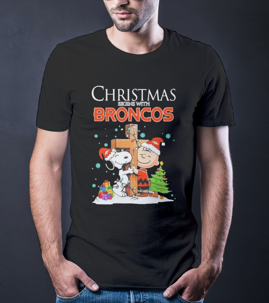 Christmas Begins With Broncos Charlie Brown Snoopy Hug Cross T-Shirt