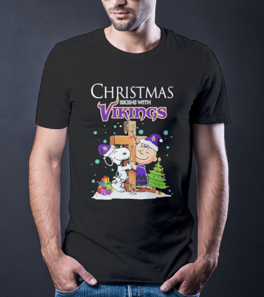 Christmas Begins With Minnesota Vikings Charlie Brown Snoopy Hug Cross T-Shirt