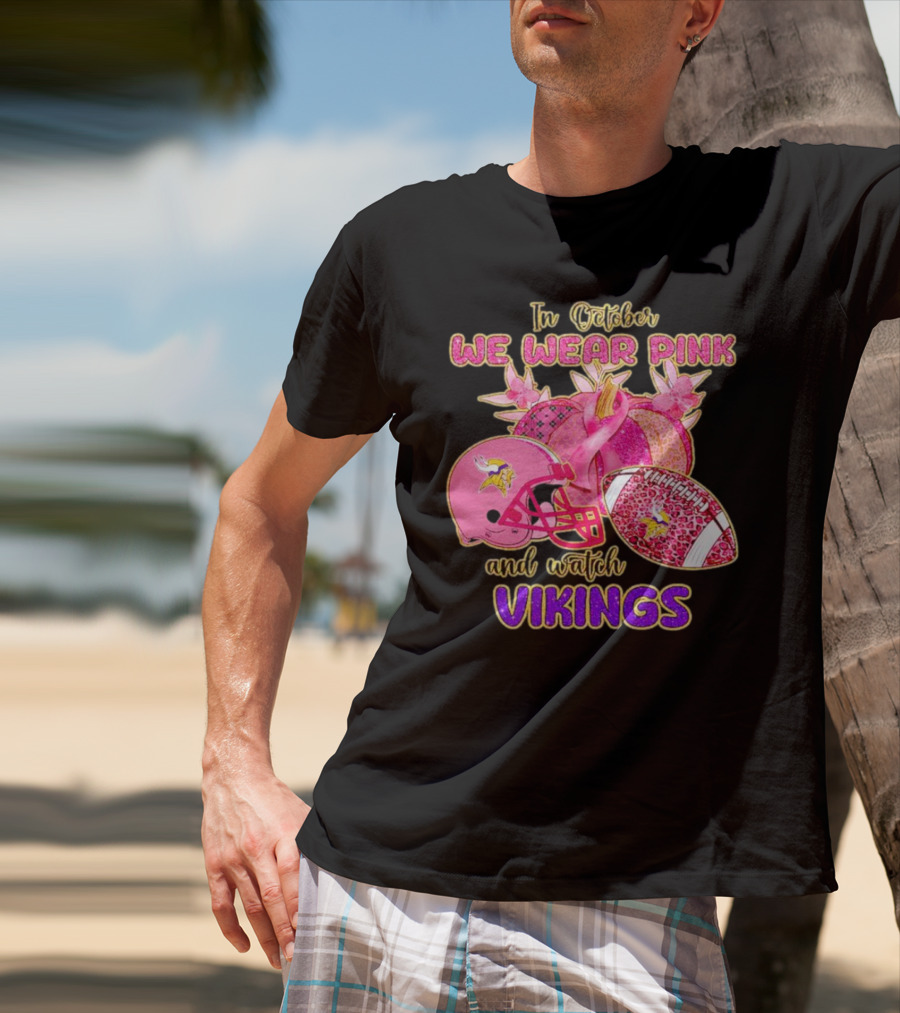 In October We Wear Pink And Watch Vikings Football Helmets Breast Cancer Awareness T-Shirt