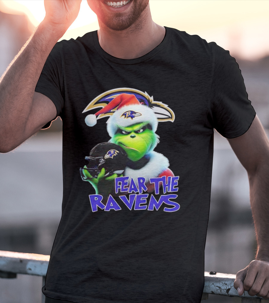 Grinch Wearing Santa Hat Holding Baltimore Ravens Helmet Fear The Ravens T-Shirt