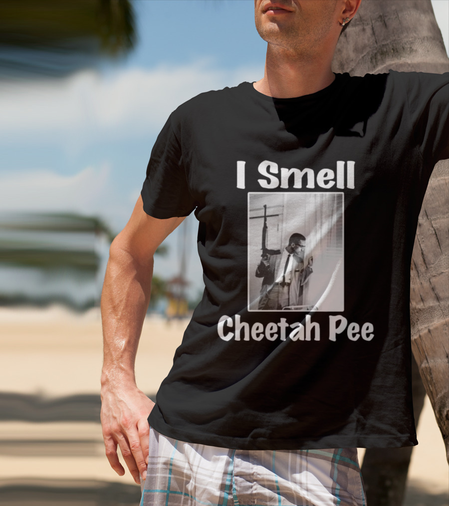 I Smell Cheetah Pee Man Holding Gun By Window T-Shirt