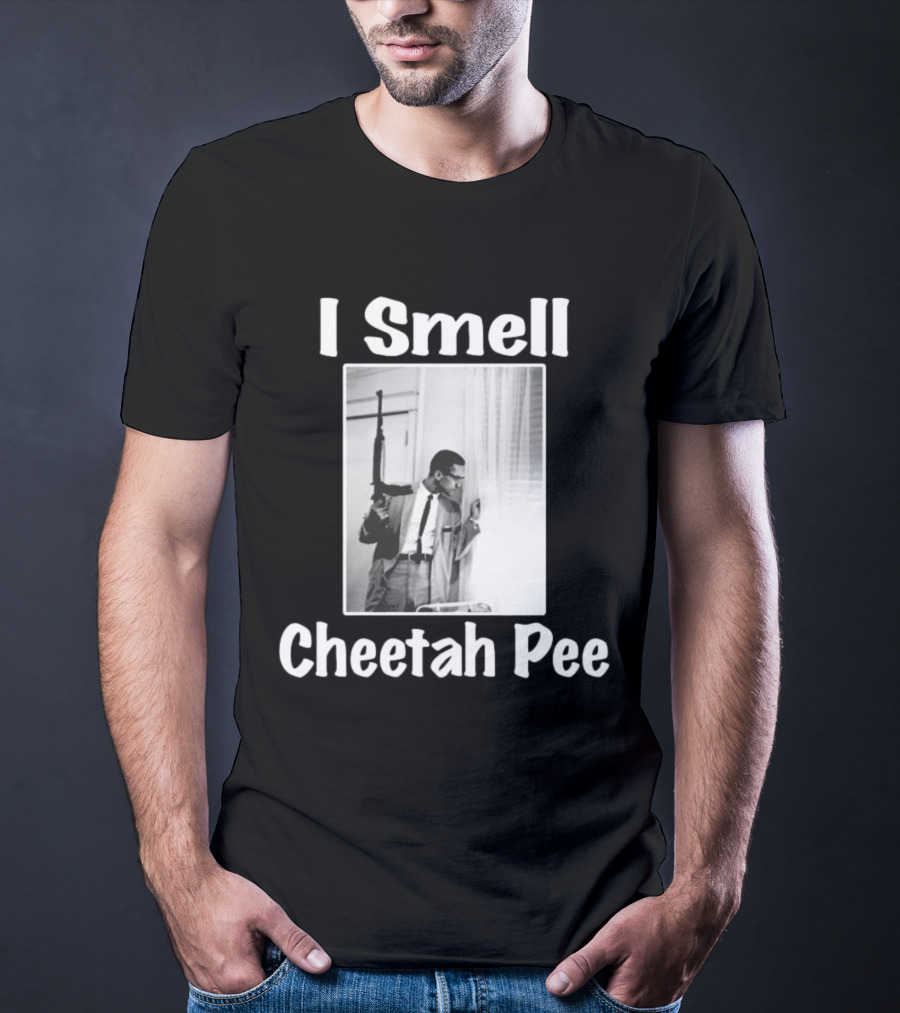I Smell Cheetah Pee Man Holding Gun By Window T-Shirt
