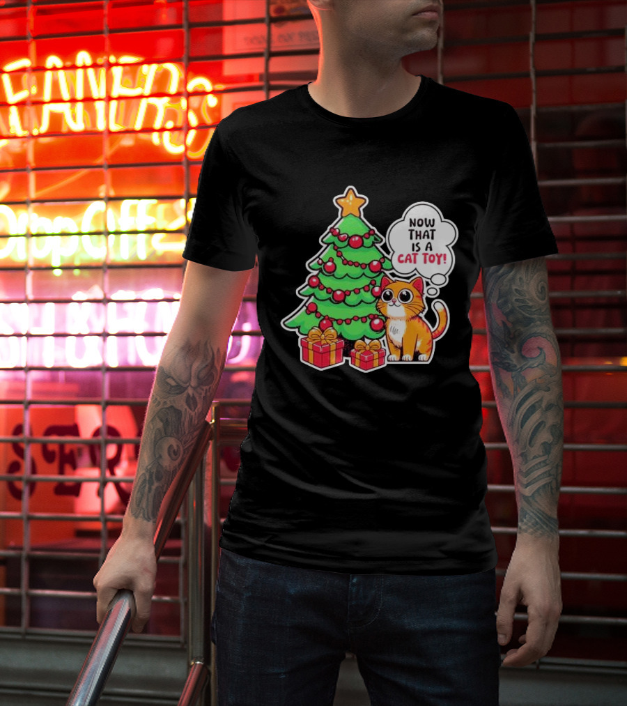 Now That Is A Cat Toy A Cute Orange Cat With Wide Eyes Next To Decorated Christmas Tree T-Shirt