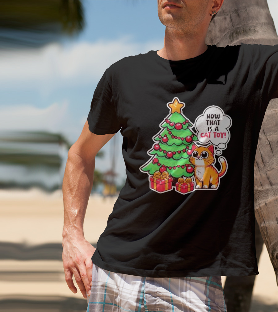 Now That Is A Cat Toy A Cute Orange Cat With Wide Eyes Next To Decorated Christmas Tree T-Shirt