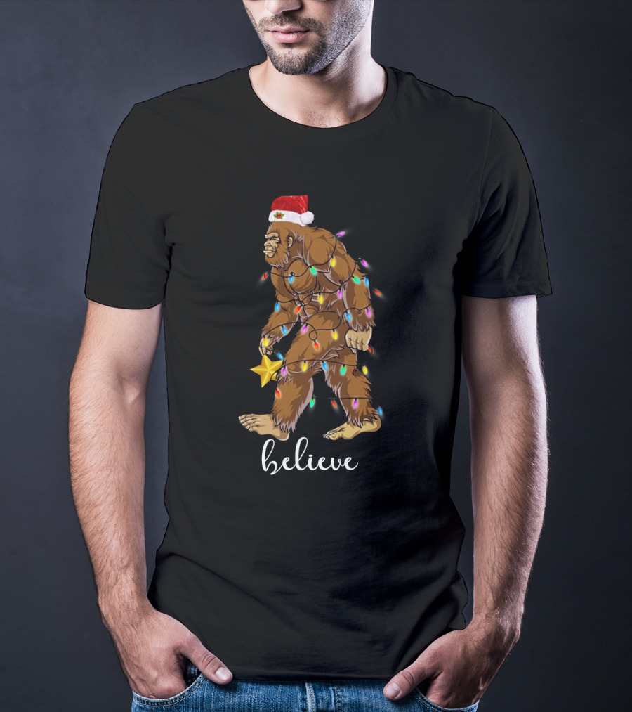 Bigfoot Christmas Lights Believe With Santa Hat And Star T-Shirt
