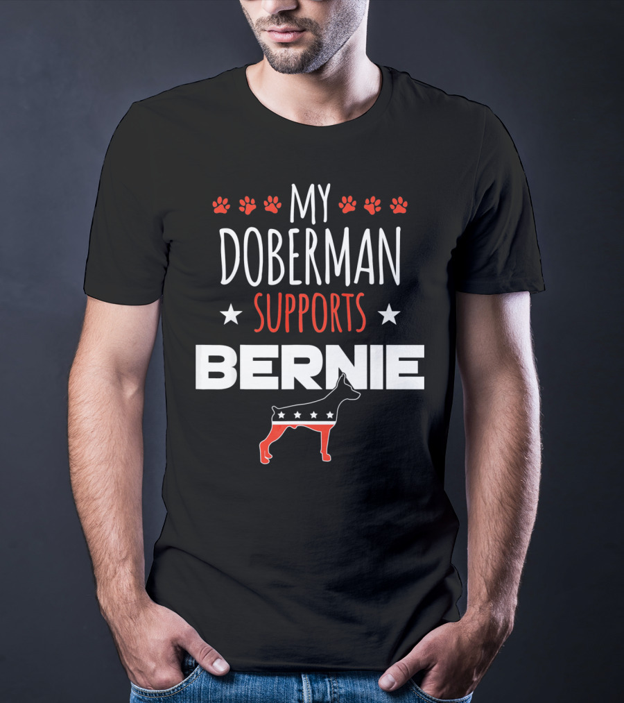 My Doberman Supports Bernie With Red White Blue Stars And Dog Paw Prints T-Shirt