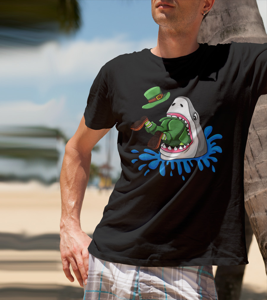 Shark Devours Leprechaun Wearing Green Outfit With Dropped Hat In Water Splash T-Shirt