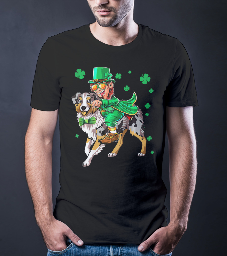 Leprechaun Riding Australian Shepherd With Shamrock Bow Tie And Clover Background T-Shirt