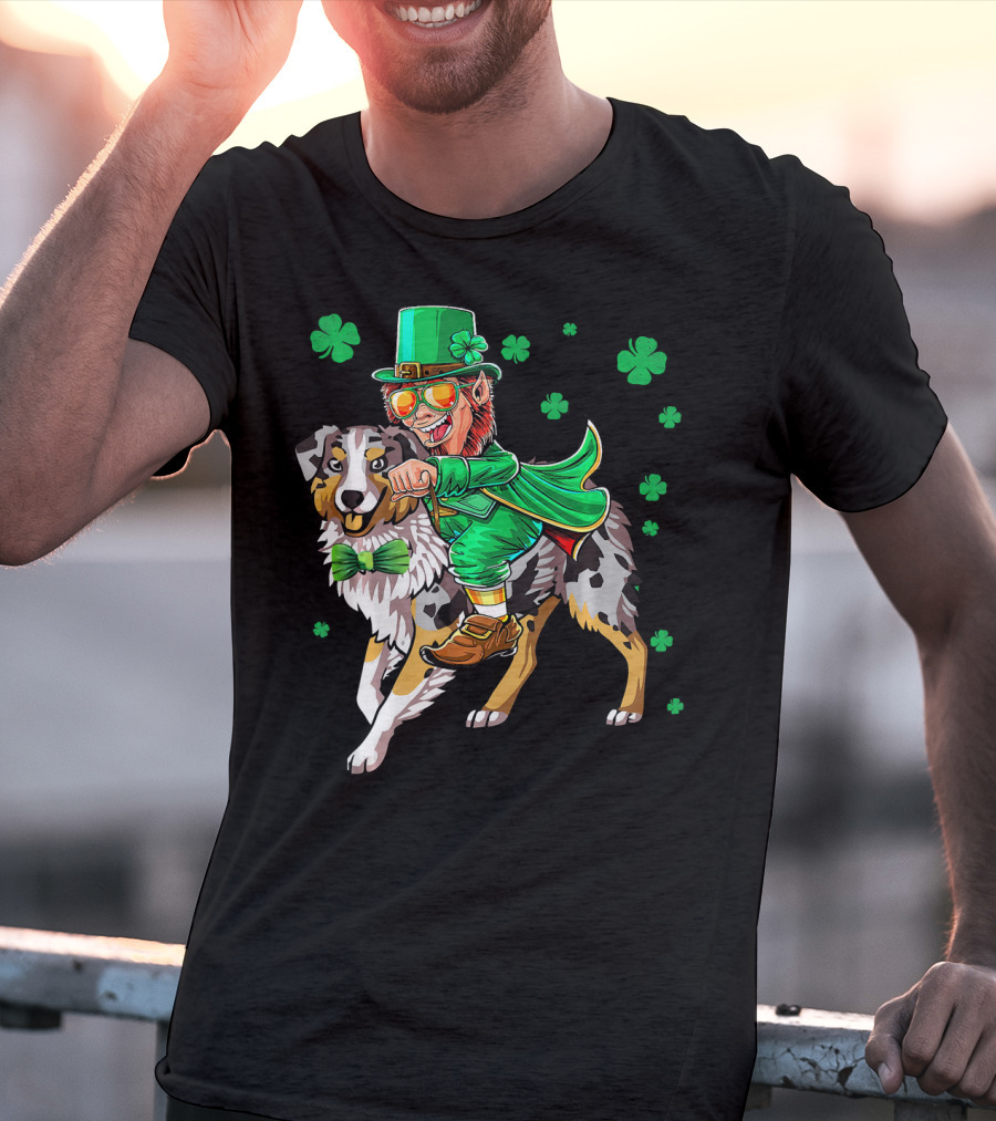 Leprechaun Riding Australian Shepherd With Shamrock Bow Tie And Clover Background T-Shirt