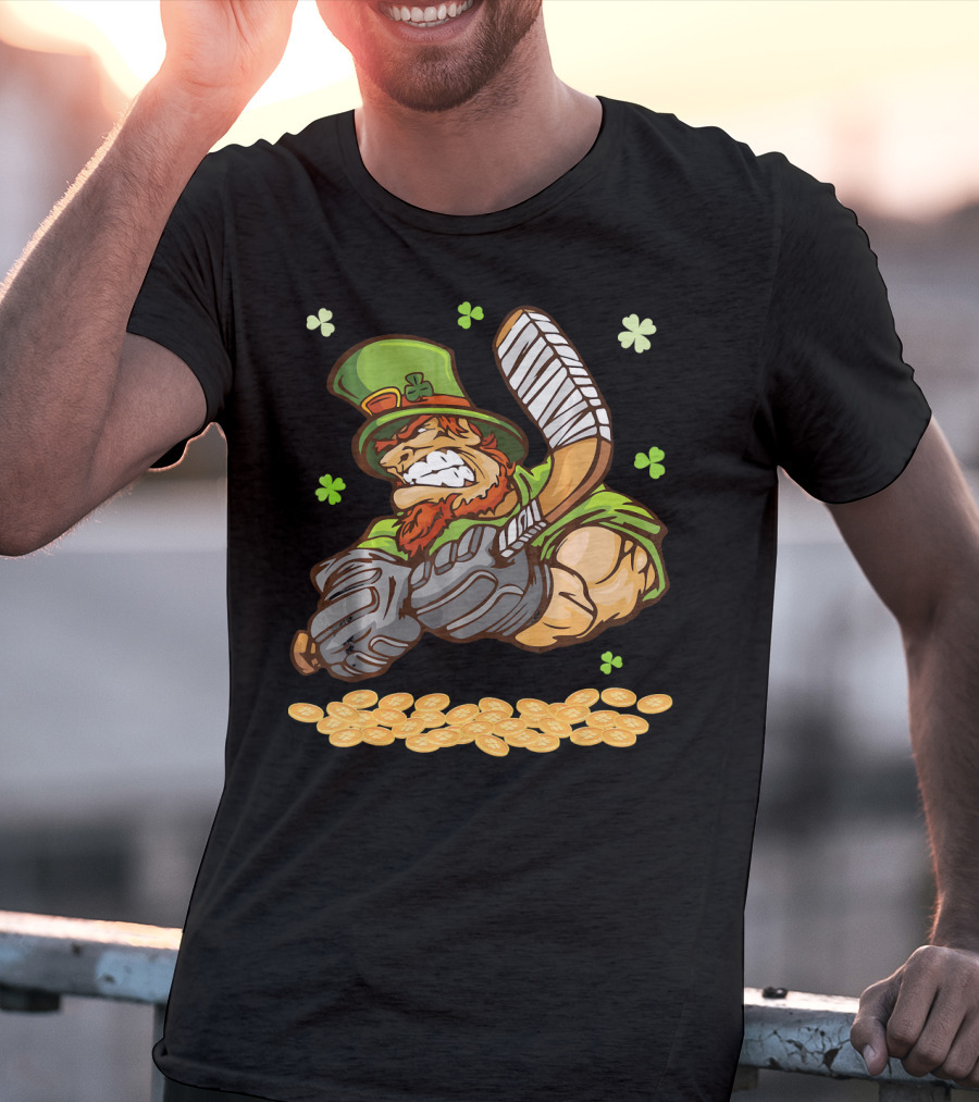 Leprechaun Swinging Hockey Stick Surrounded By Shamrocks And Gold Coins T-Shirt