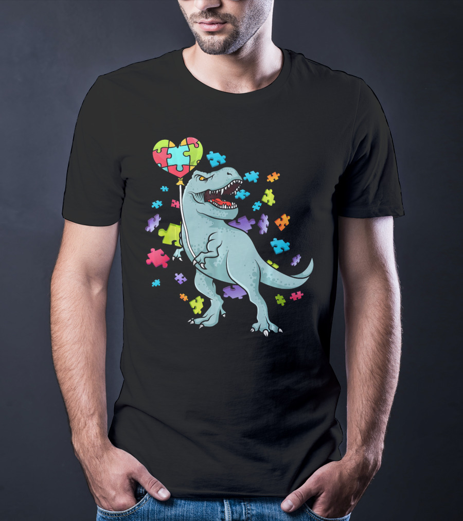 Autism Awareness Dinosaur With Puzzle Heart Balloon And Colorful Puzzle Pieces T-Shirt