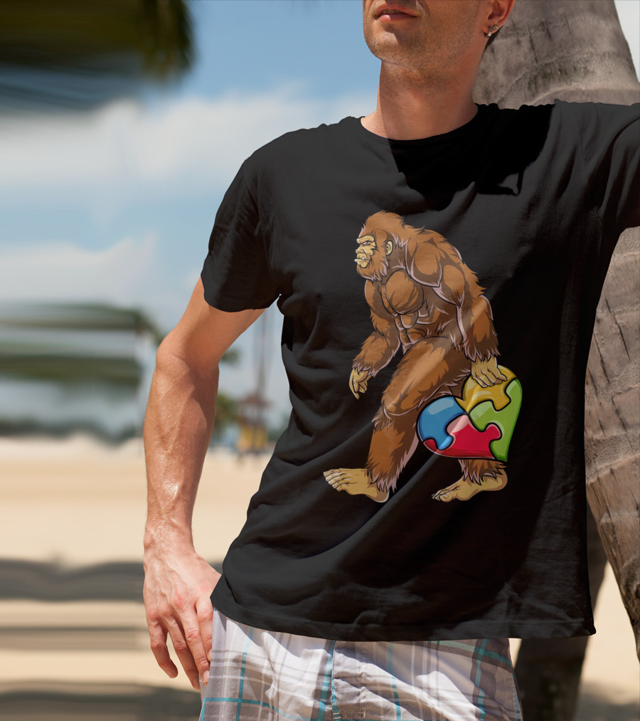 Bigfoot Holding Puzzle Piece Heart Autism Awareness T-Shirt