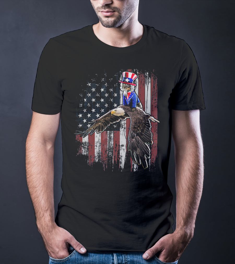 Uncle Sam Costume Cat Riding Bald Eagle On American Flag Background T-Shirt