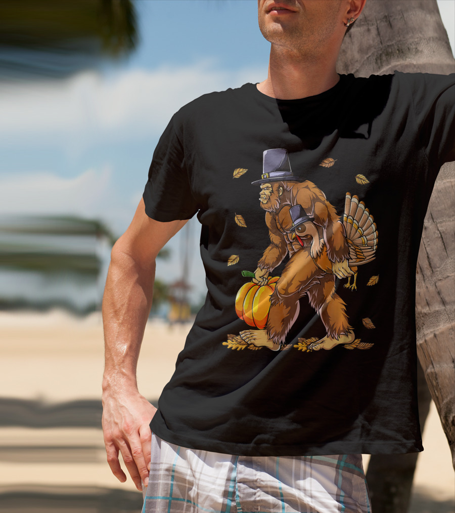 Bigfoot Pilgrim Turkey Carrying Pumpkin Thanksgiving T-Shirt