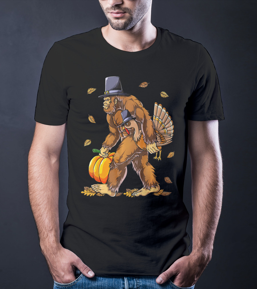 Bigfoot Pilgrim Turkey Carrying Pumpkin Thanksgiving T-Shirt